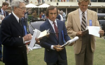 Racing legend Jackie Stewart, center, has been a judge at Pebble Beach. Flanking him here are the late Otis Chandler, left, and Briggs Cunningham.